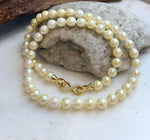 Extreme luster Akoya golden pearl necklace with sterling silver closure