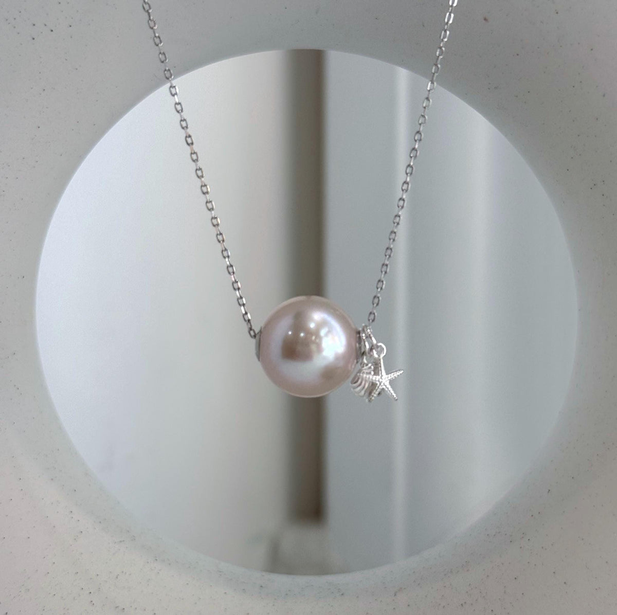 12.8mm Edison pearl floating pendant with solid 18K gold setting