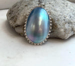 Statement blue Mabe pearl pendant with extreme high luster