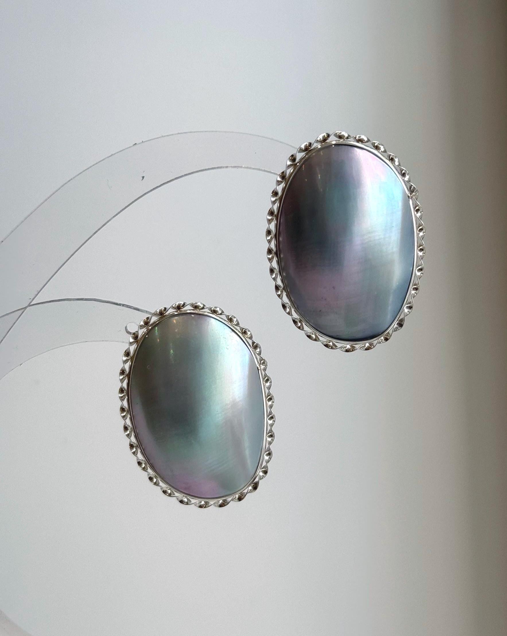 Genuine ocean Mabe pearl earrings with beautiful blue iridescent glow