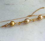 Genuine saltwater pearl necklace with three graduated golden pearls