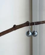 Tahitian platinum pearl hook earrings with brilliant mirror luster