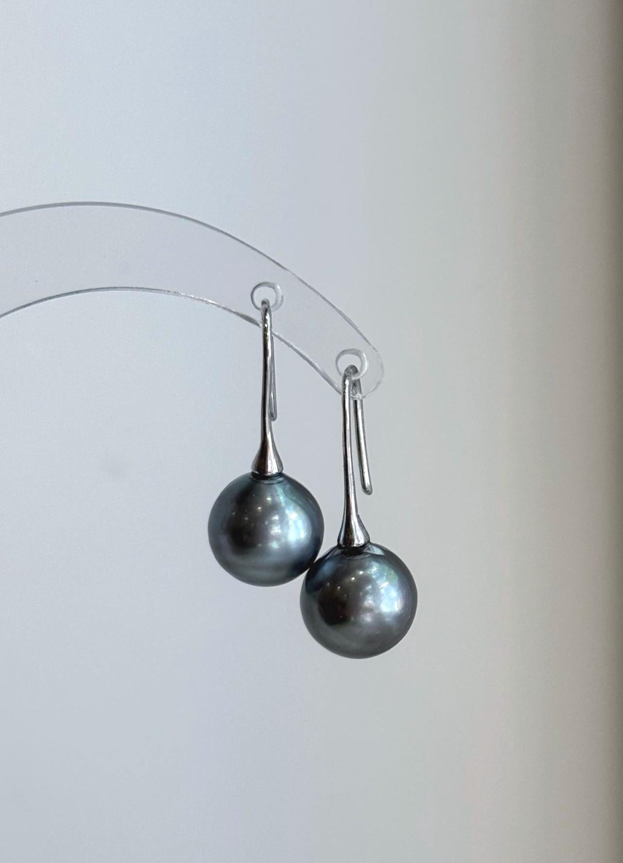 Genuine Tahitian saltwater pearl earrings with cool platinum tones