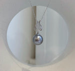 Platinum Tahitian pearl necklace pendant with elegant lyre setting
