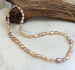 Hand-knotted Keshi pearl necklace with individually shaped pearls and rich metallic-looking luster.