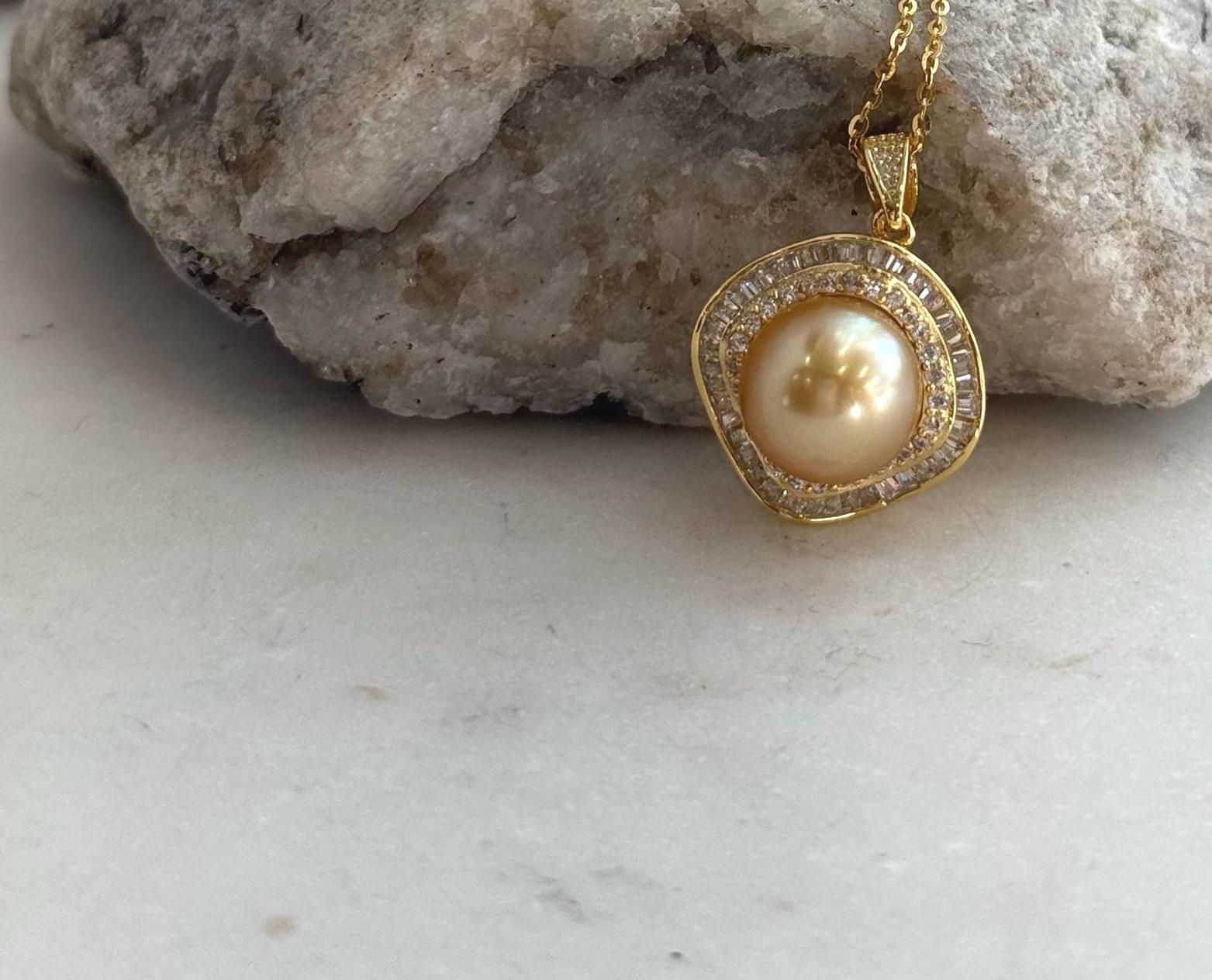 Deep tea golden South Sea pearl pendant showing natural color and beautiful shine