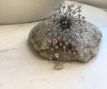 Genuine Tahitian saltwater pearl brooch featuring a dramatic fireworks-inspired jewelry design.