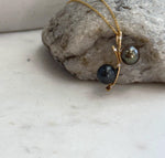 Genuine Tahitian saltwater pearl pendant featuring two naturally lustrous pearls