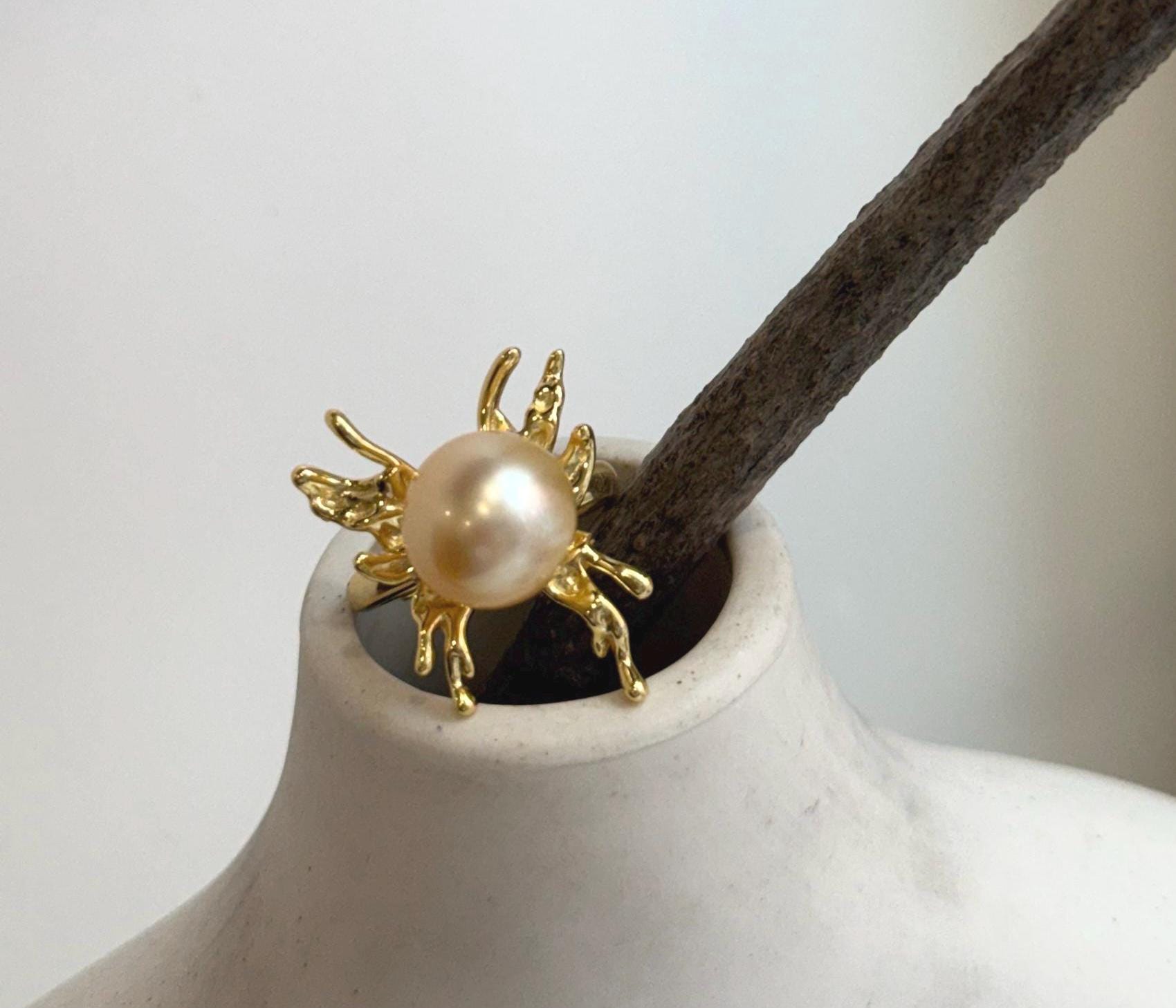 S925 sterling silver butterfly ring accented with an 11.6mm lustrous South Sea golden pearl.