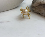 Deep golden South Sea ocean pearl ring with brilliant extreme luster and delicate silver butterfly detail.