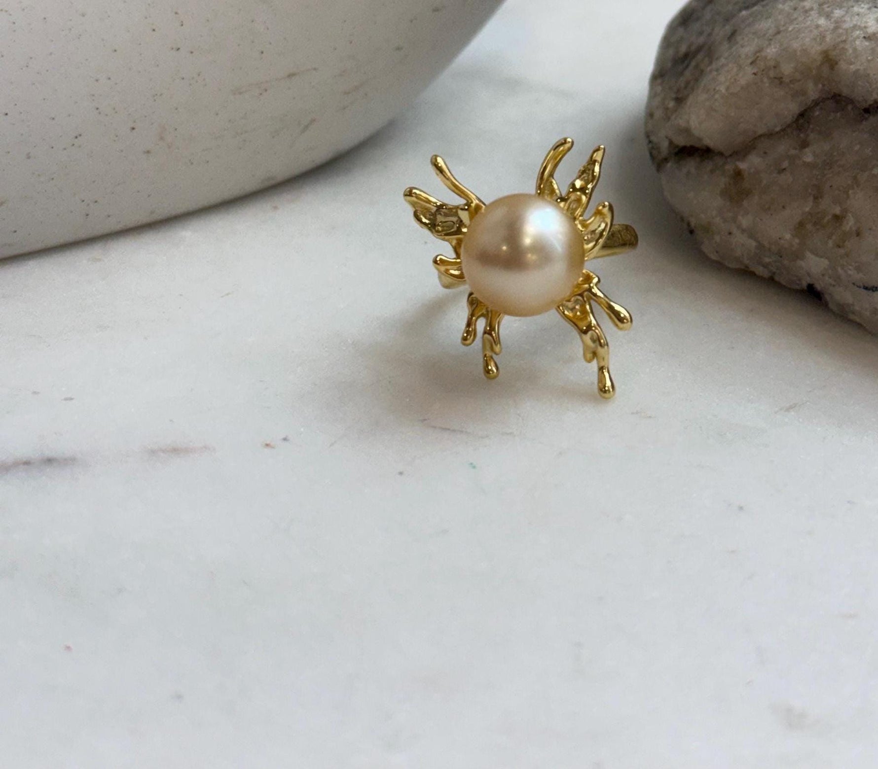 Elegant butterfly pearl ring featuring a large genuine South Sea deep golden saltwater pearl.