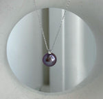 Genuine 0.05ct diamond set in solid 18K gold with a luminous 11mm Edison purple freshwater pearl.