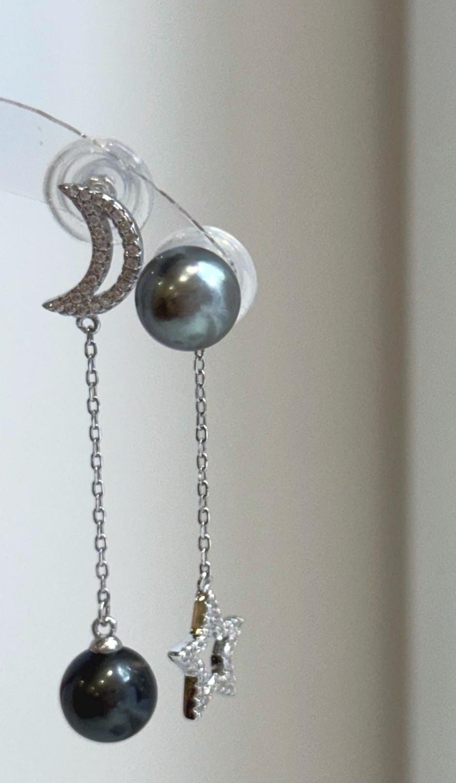 Tahitian saltwater pearl earrings with metallic platinum hunter overtones and delicate star moon silver design