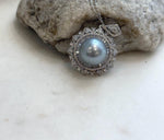 Luxury Tahitian silver pearl pendant with exceptional mirror-like luster and minimalist sterling silver design.