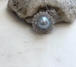 Rare huge Tahitian silver ocean pearl pendant with extreme mirror luster and S925 sterling silver chain.