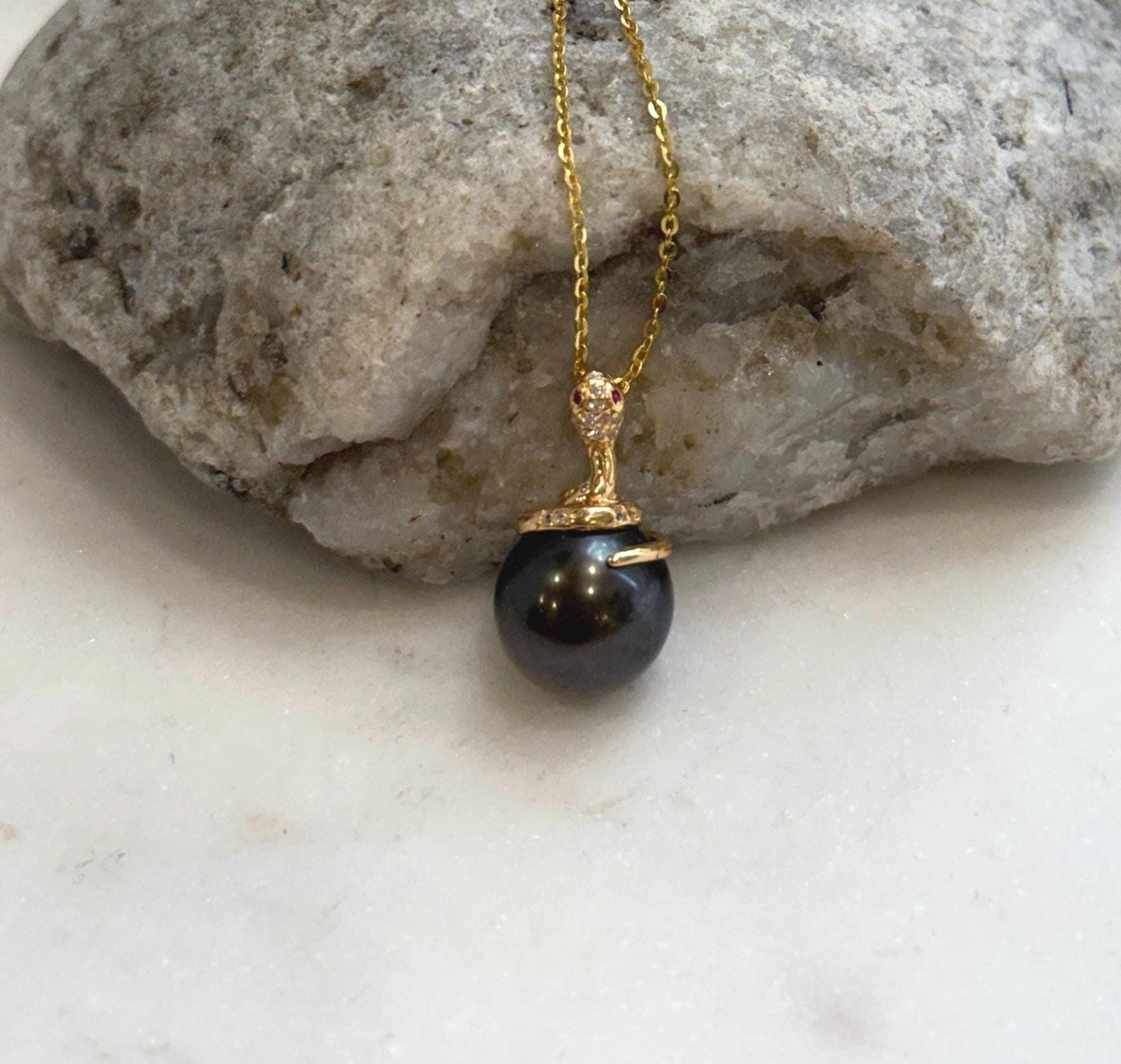 Luxury Tahitian chocolate pearl pendant with mirror shine and sterling silver detail