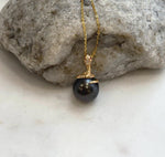 Luxury Tahitian chocolate pearl pendant with mirror shine and sterling silver detail