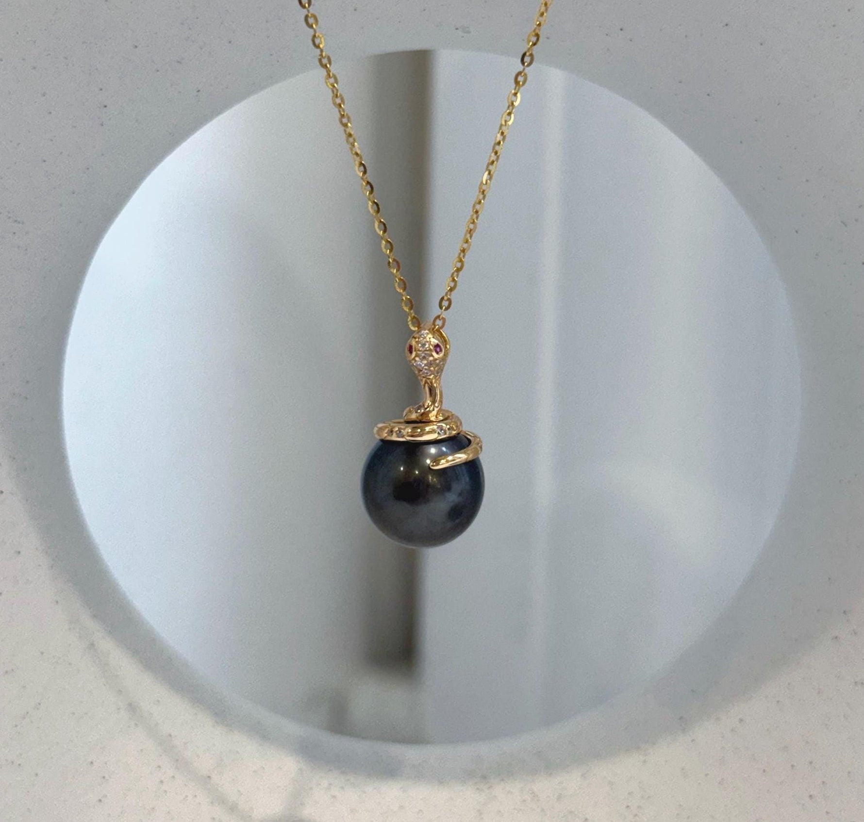Natural Tahitian chocolate pearl pendant with rich warm brown overtones