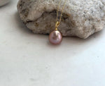 Minimalist 12.1mm freshwater pearl pendant for elegant everyday jewelry.