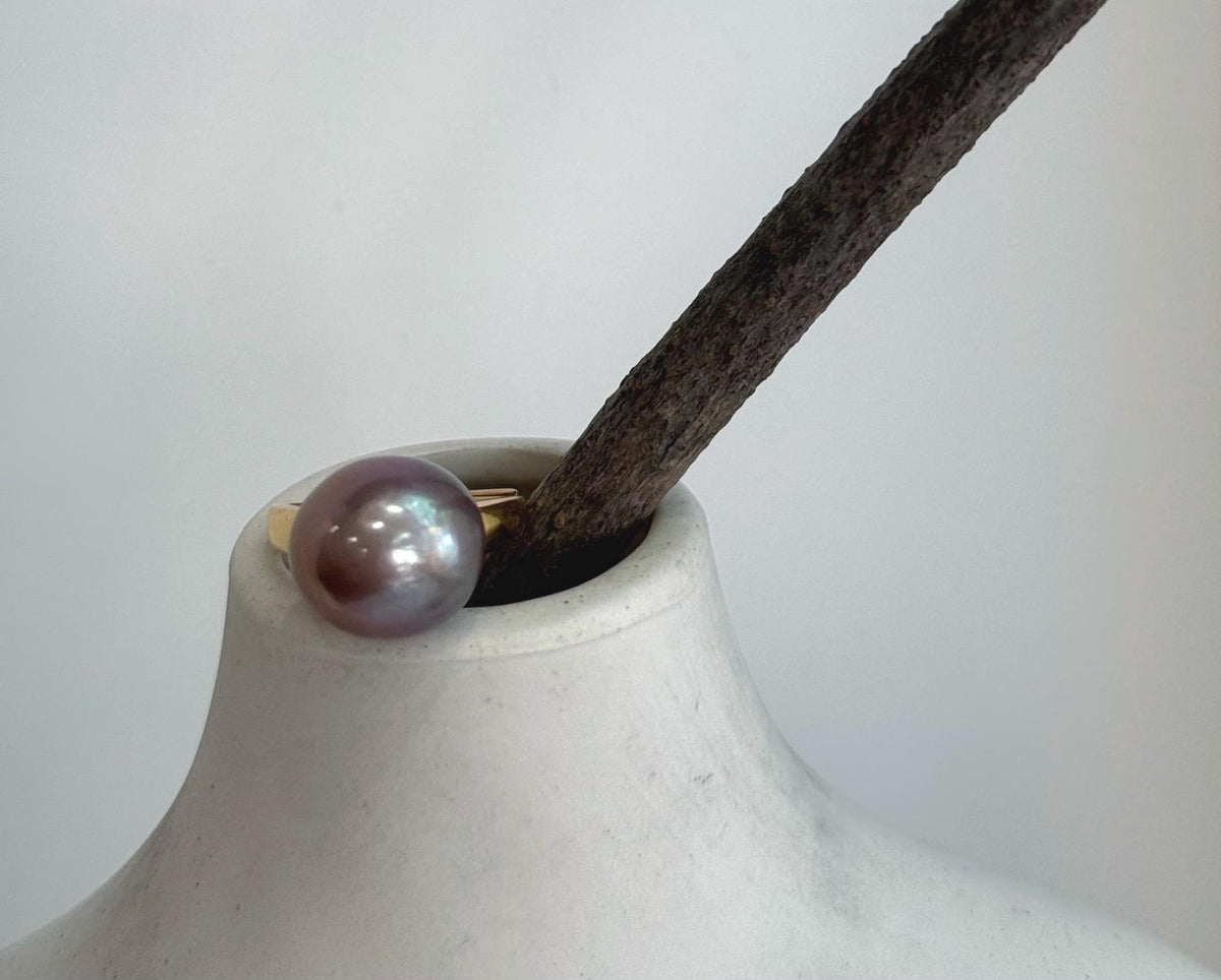 Close-up of large Edison pearl ring showing extreme mirror-like luster and natural pearl beauty.