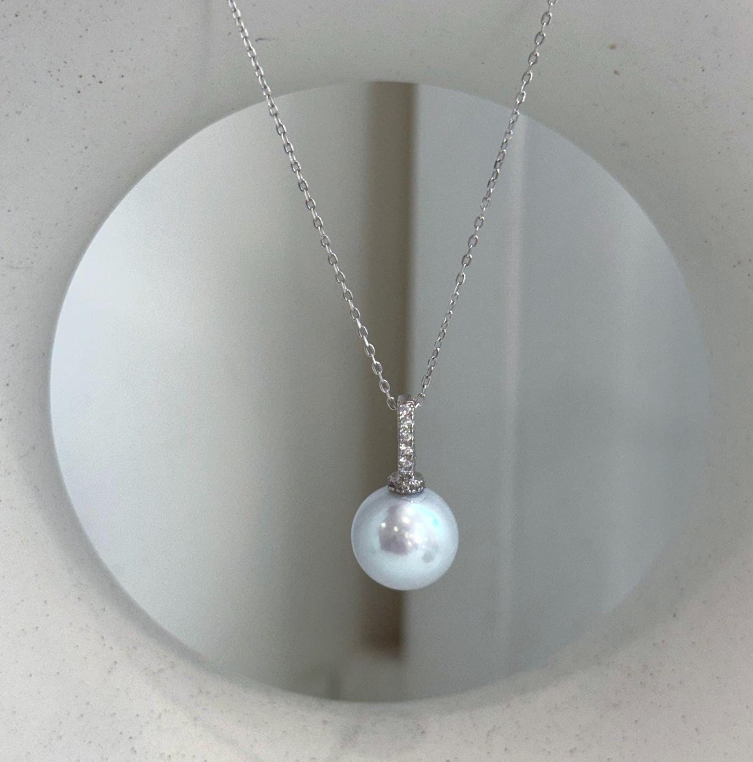 Elly’s 11.6mm Edison white silver pearl pendant with extreme mirror luster and S925 sterling silver setting.