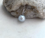 White silver freshwater pearl pendant with luminous metallic overtones and S925 sterling silver setting.