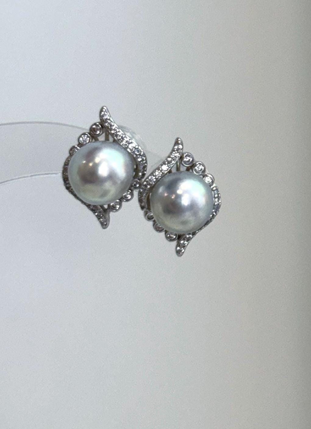 Elly’s genuine 8.8mm saltwater Akoya pearl earrings, an elegant blue silver pearl jewelry gift.