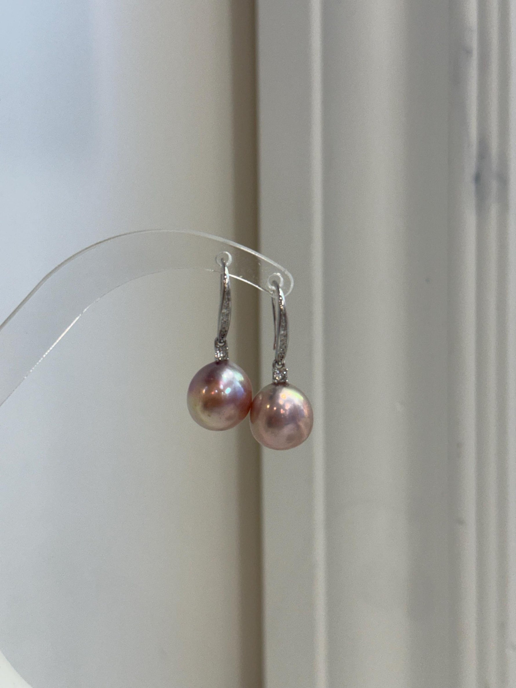 Elegant pink gold Edison pearl drop earrings with 12.2mm genuine freshwater pearls and sterling silver hooks.
