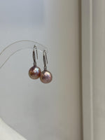 3.1cm long Edison pearl drop earrings featuring luminous pink gold freshwater pearls.