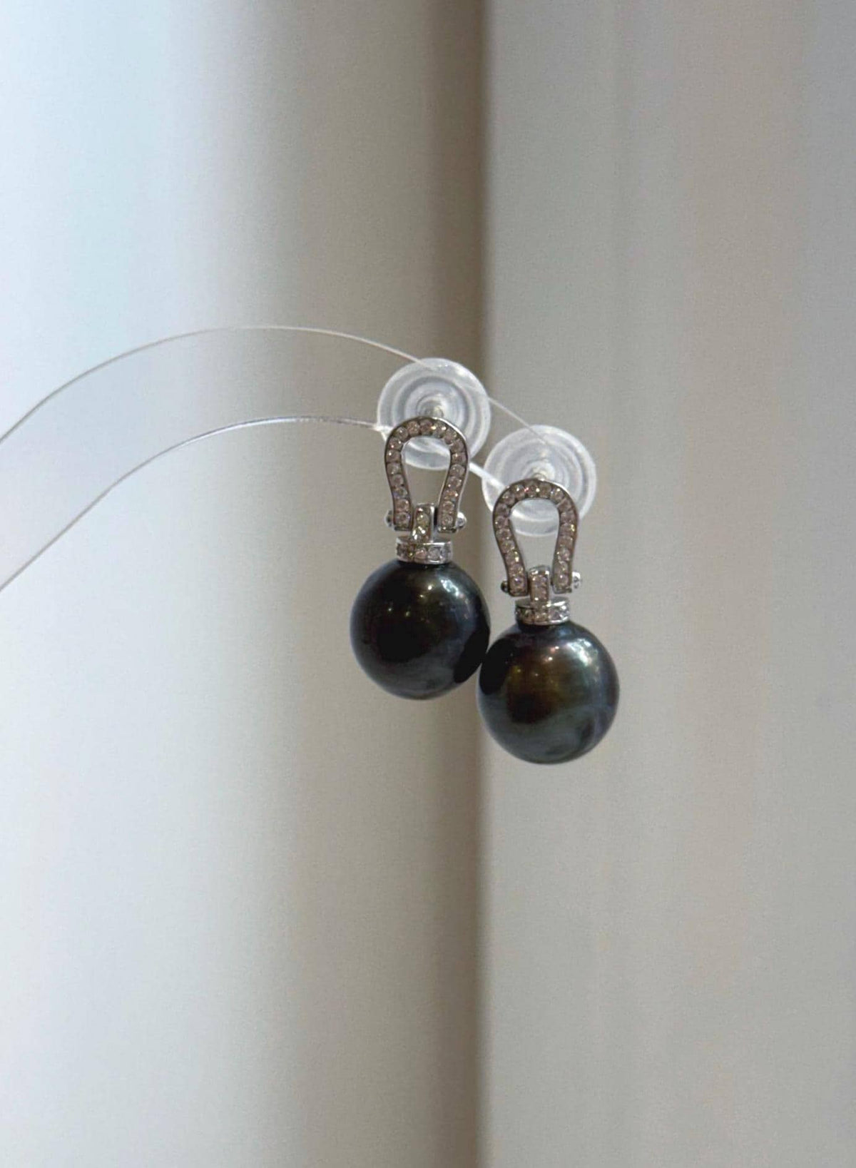 Tahitian peacock hunter pearl earrings with extreme mirror luster and elegant S925 sterling silver settings.