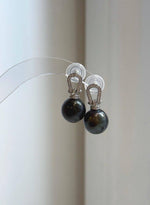 Tahitian peacock hunter pearl earrings with extreme mirror luster and elegant S925 sterling silver settings.