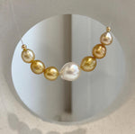 South Sea pearl smile necklace with 7 graduated genuine saltwater pearls and elegant minimalist design