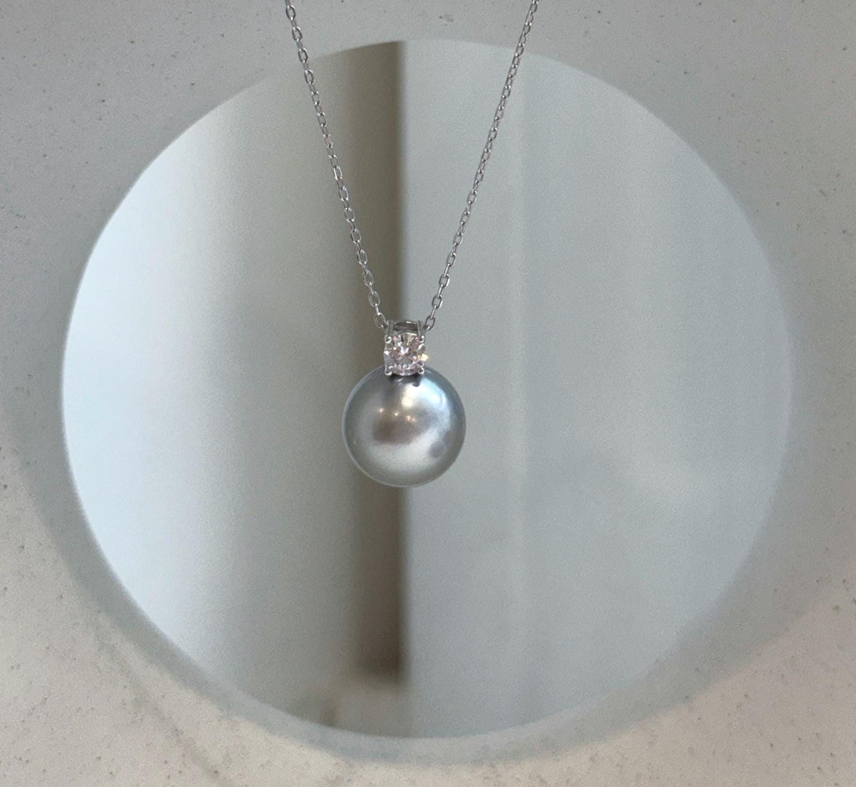11.9mm Tahitian pearl pendant featuring a genuine saltwater ocean pearl with beautiful mirror luster and S925 sterling silver.