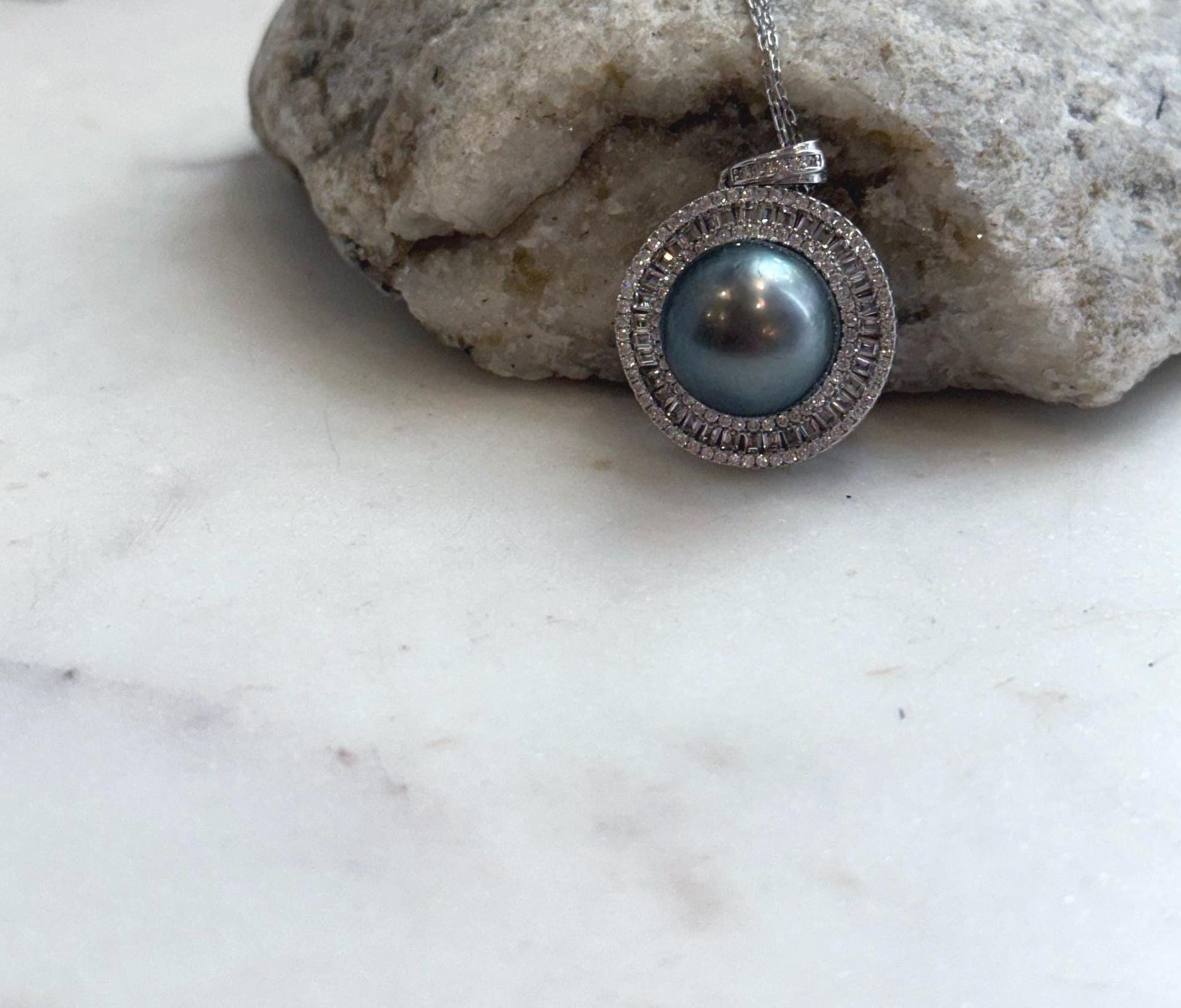 Large Tahitian ocean pearl necklace with 13mm genuine saltwater pearl and bright reflective luster.