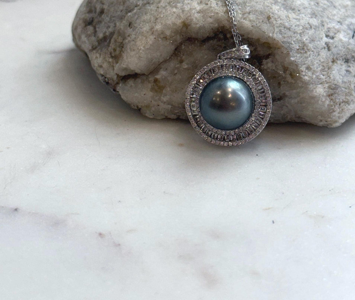 S925 sterling silver Tahitian pearl necklace with a genuine 13mm ocean pearl centerpiece.