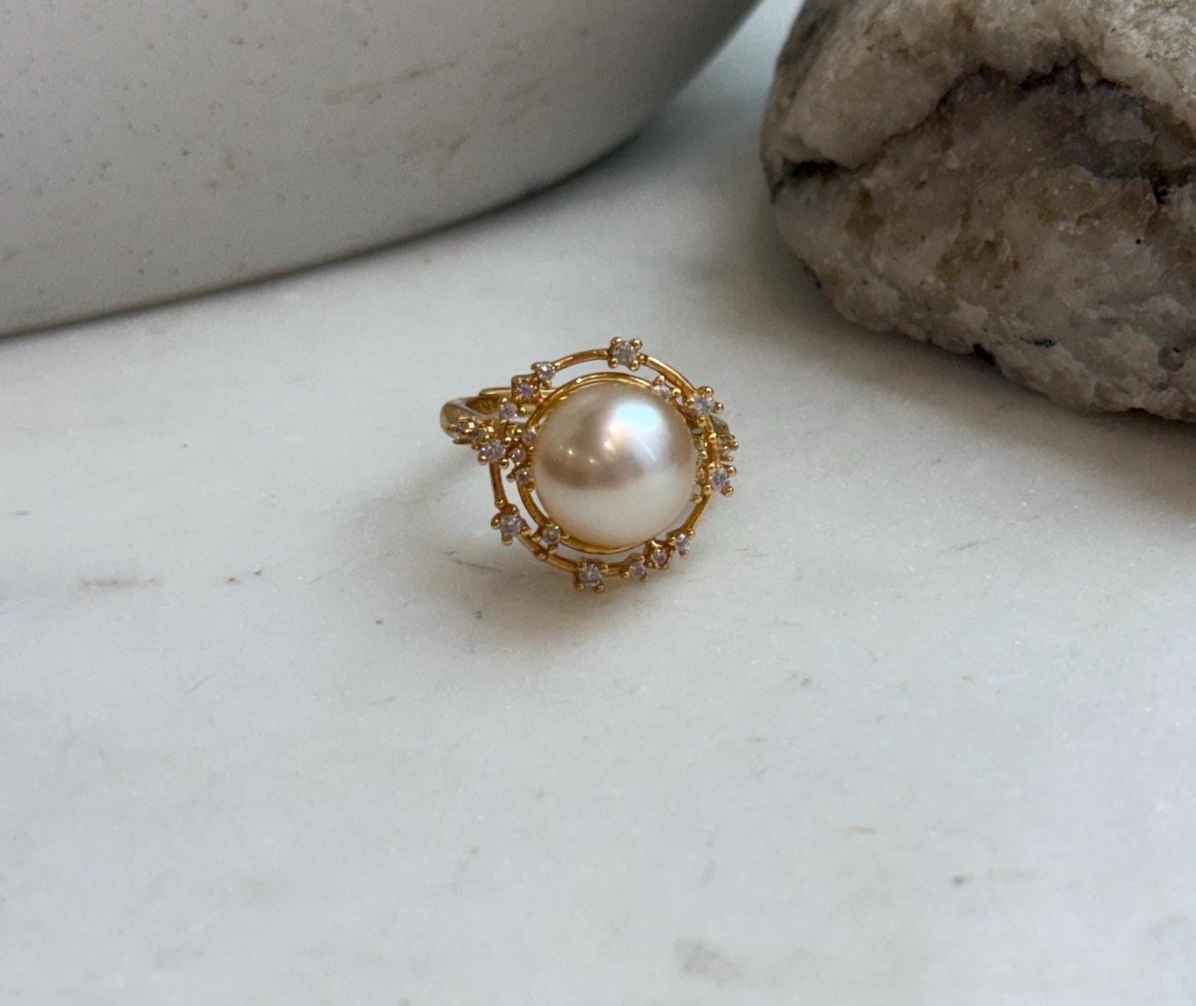 Natural saltwater South Sea golden pearl ring featuring a luminous 10.6mm pearl and sterling silver band