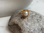 Luxury 10.6mm South Sea pearl ring showing rich golden color, iridescent tones, and reflective luster