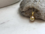 Genuine South Sea ocean pearl necklace pendant with deep golden tea tone and minimalist silver design