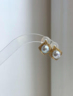 Genuine saltwater Akoya pearl earrings with elegant blue silver iridescent overtones