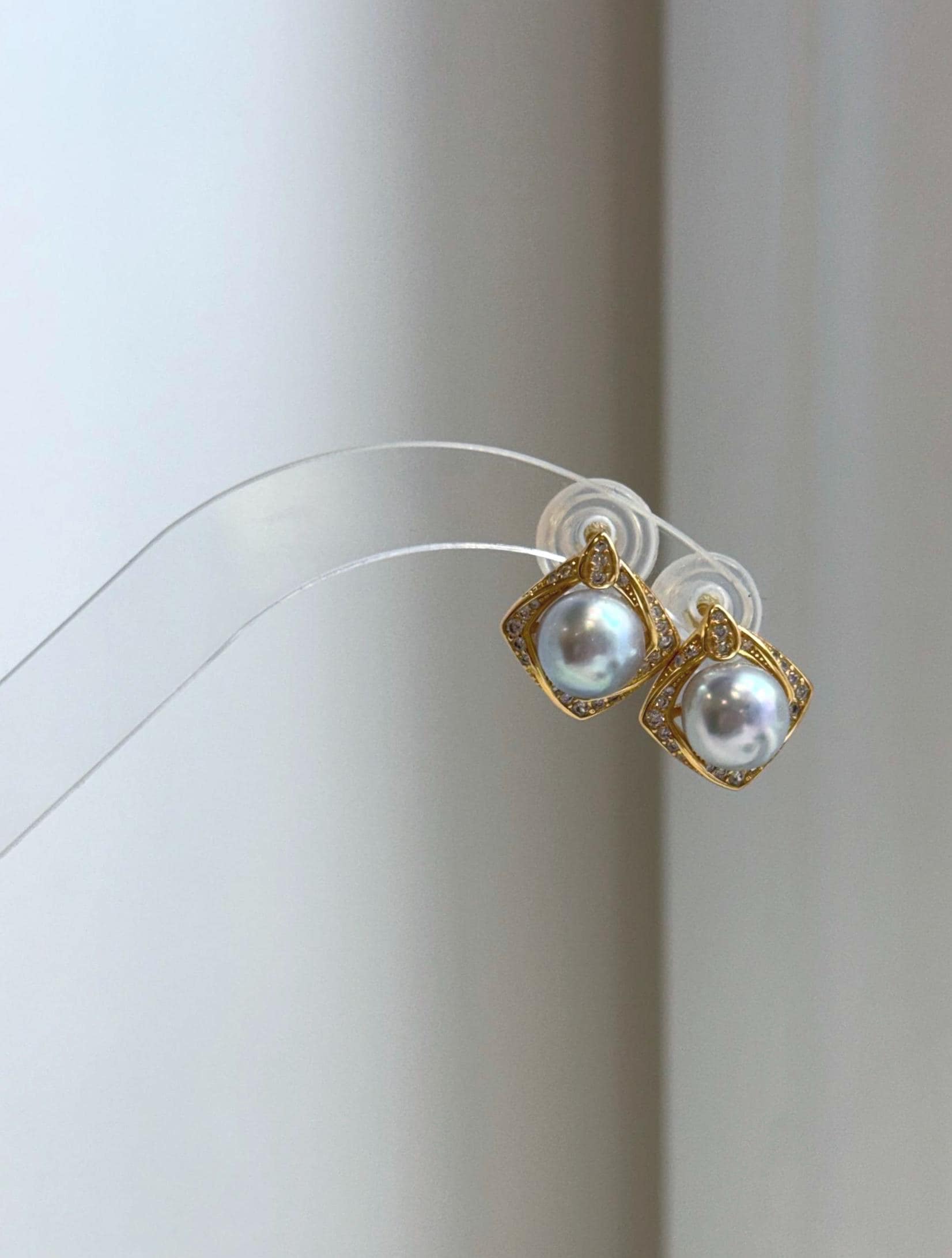 Genuine saltwater Akoya pearl earrings with elegant blue silver iridescent overtones