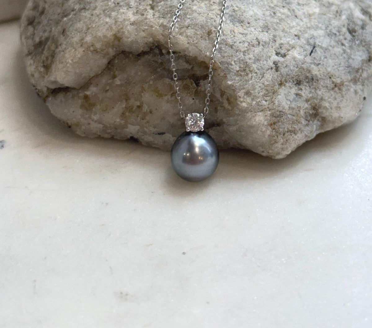Tahitian ocean pearl moissanite pendant with brilliant mirror luster and elegant sterling silver setting