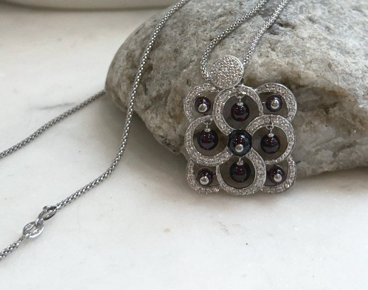 Genuine natural garnet pendant necklace with rich deep red gemstone color