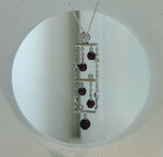 Genuine garnet jewelry set with elegant pendant necklace and matching ring