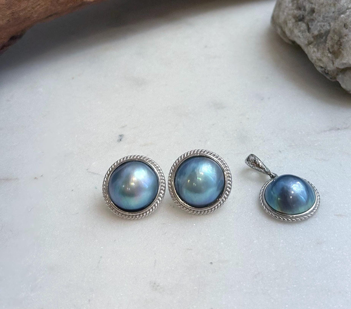 Genuine ocean Mabe pearl earrings and pendant with vivid blue green iridescence