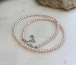 Elly’s genuine pale pink freshwater pearl necklace