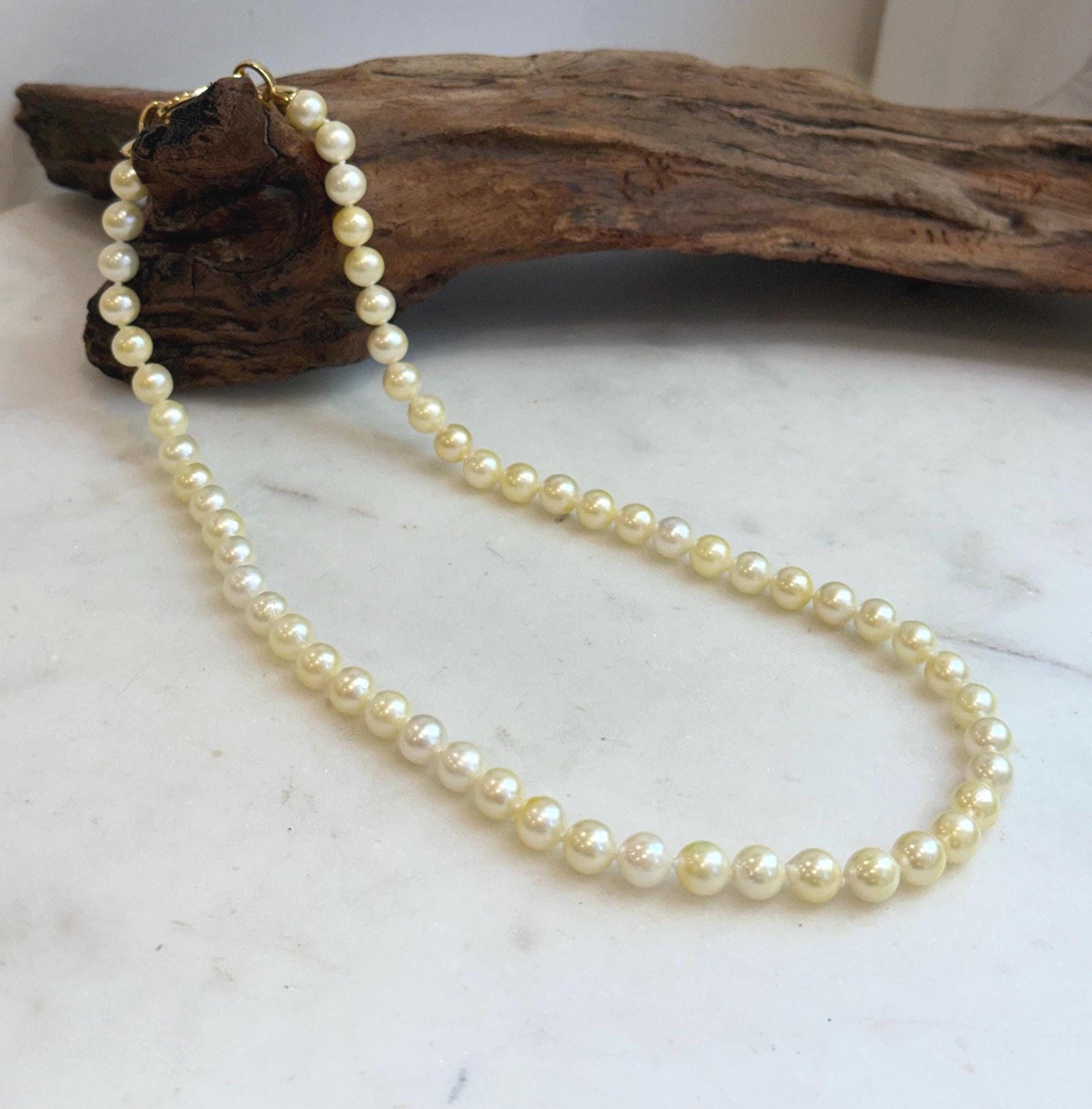 Elly’s 7–7.5mm Japanese Akoya golden pearl necklace with extreme mirror luster