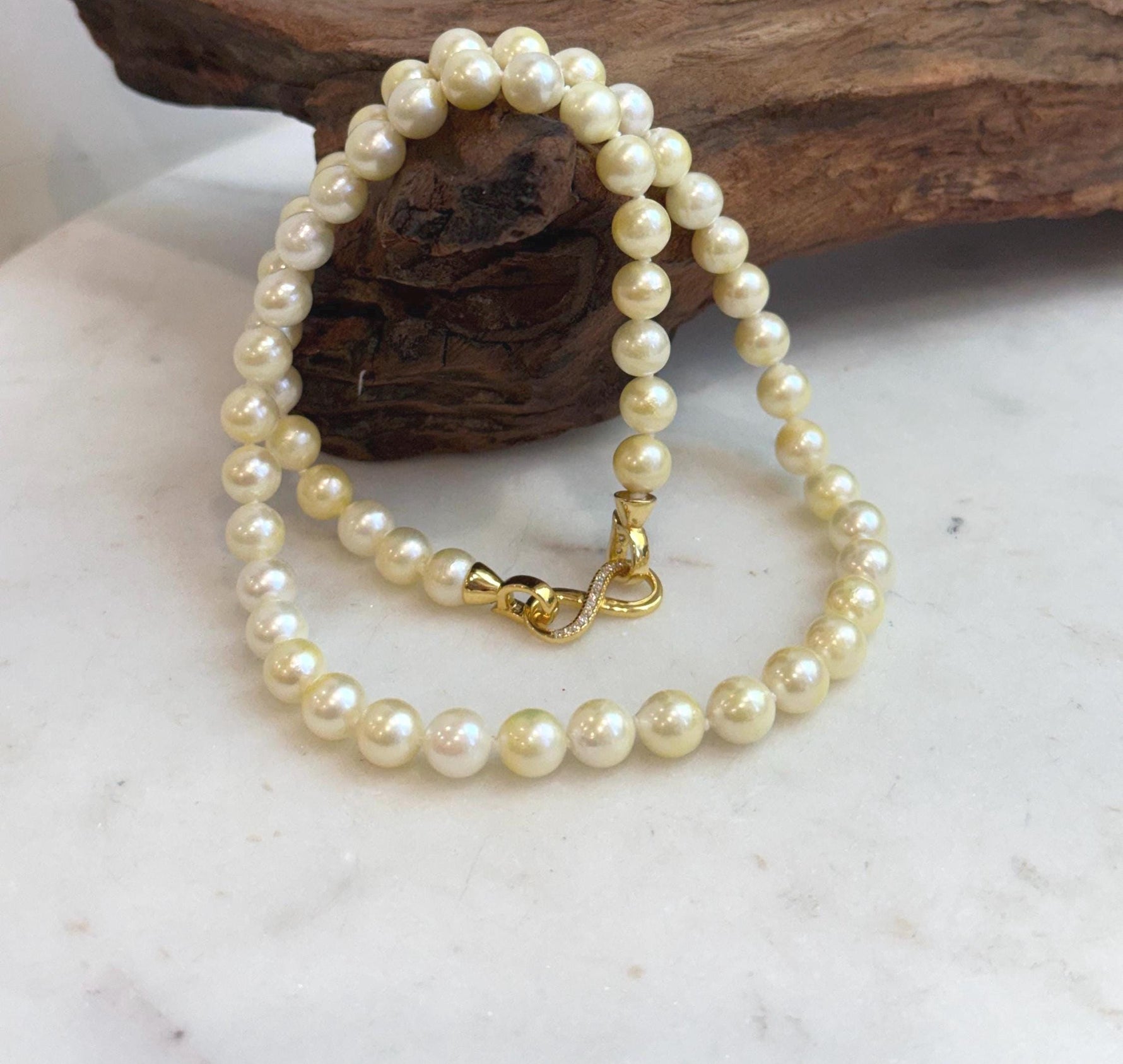 Natural golden Akoya pearl necklace with brilliant mirrored luster