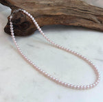 Small freshwater pearl necklace with soft pale pink natural tone