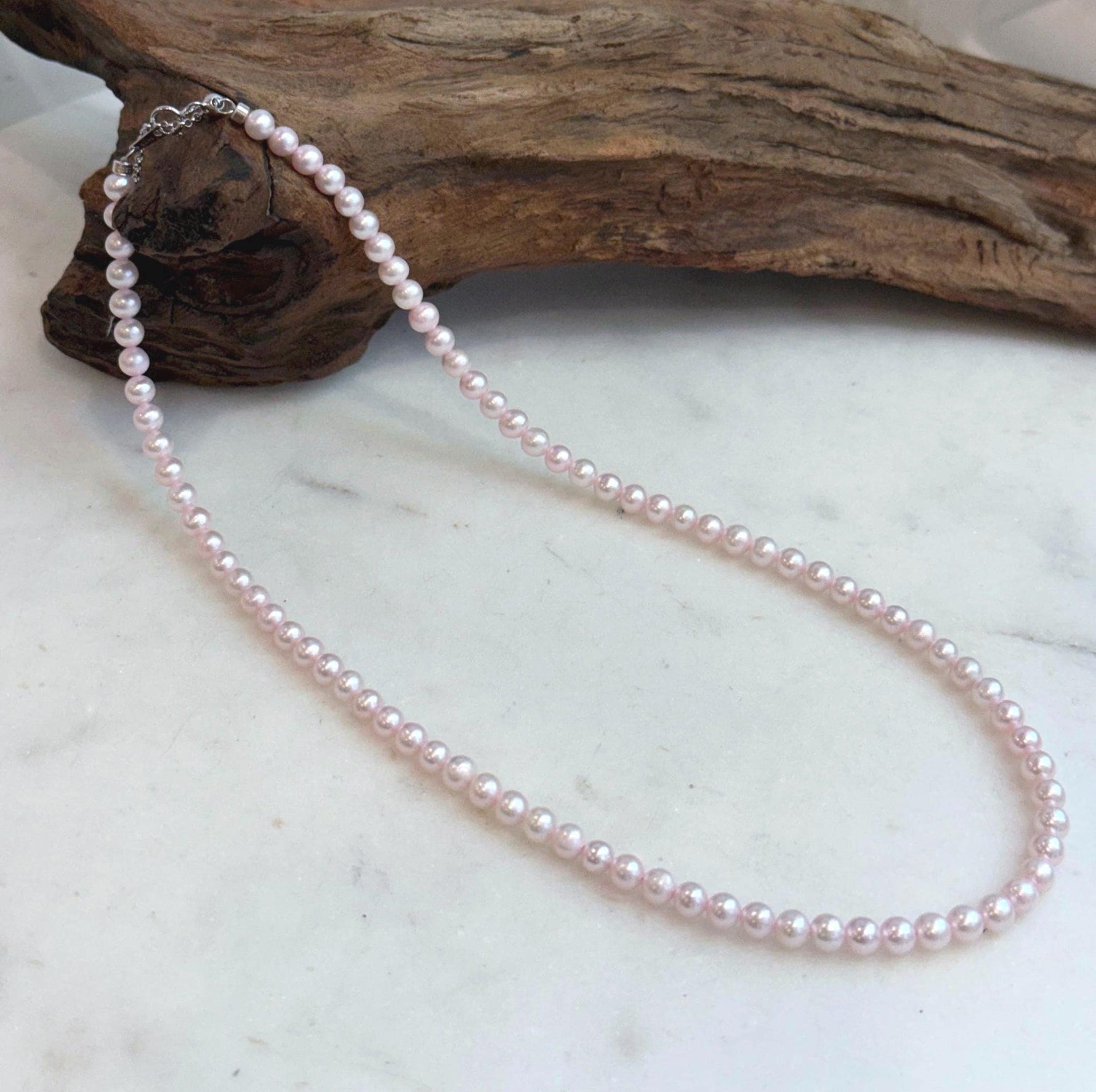 Small freshwater pearl necklace with soft pale pink natural tone