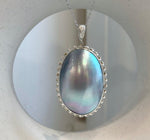Huge blue iridescent ocean Mabe pearl pendant with extreme mirror luster